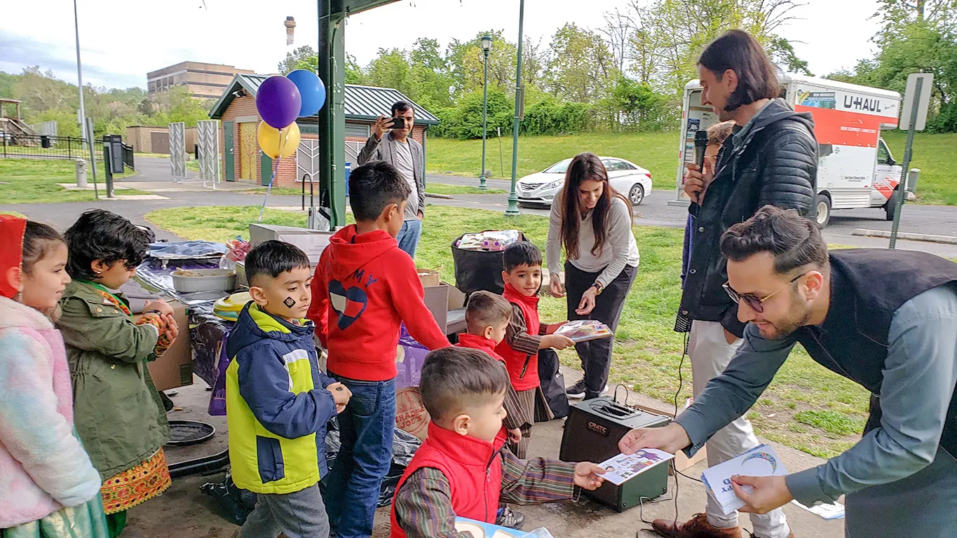 Distributing Eid gifts to Kids