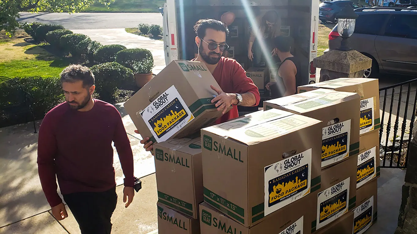 moving food boxes to truck