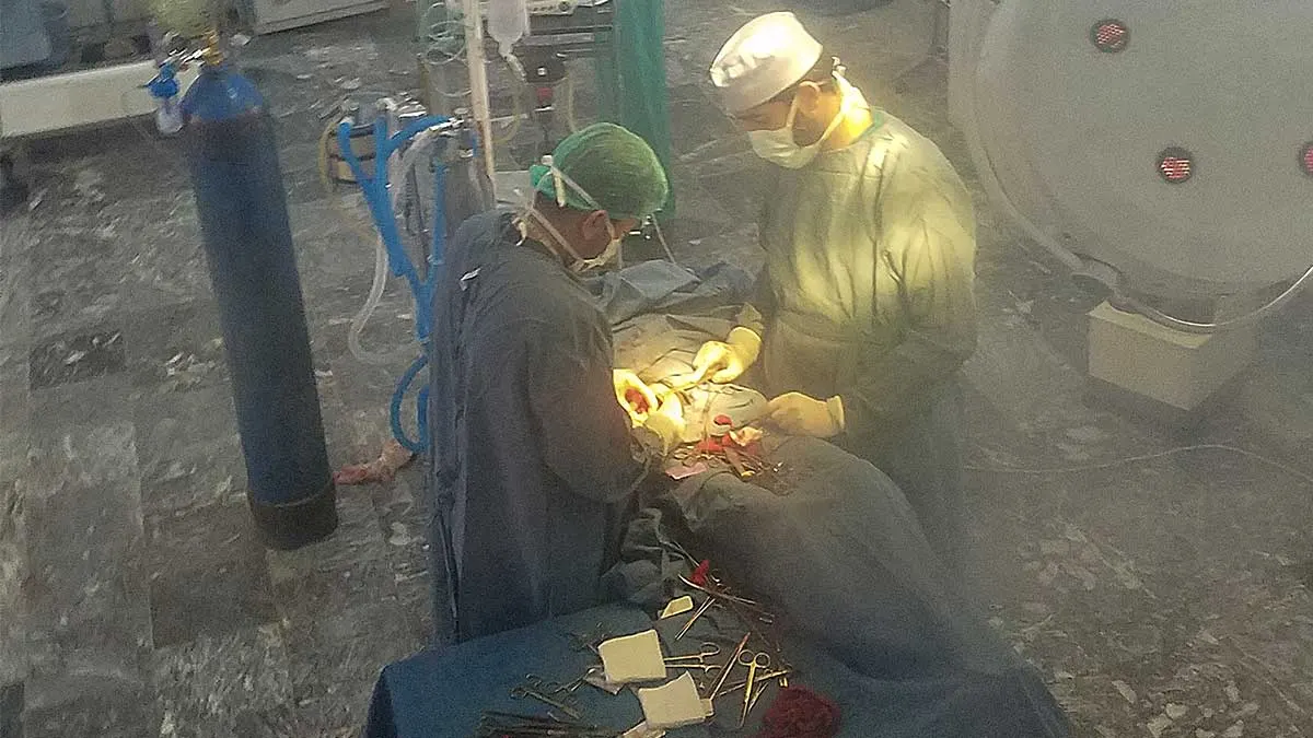 Surgeons in OR at Aliabad hosp