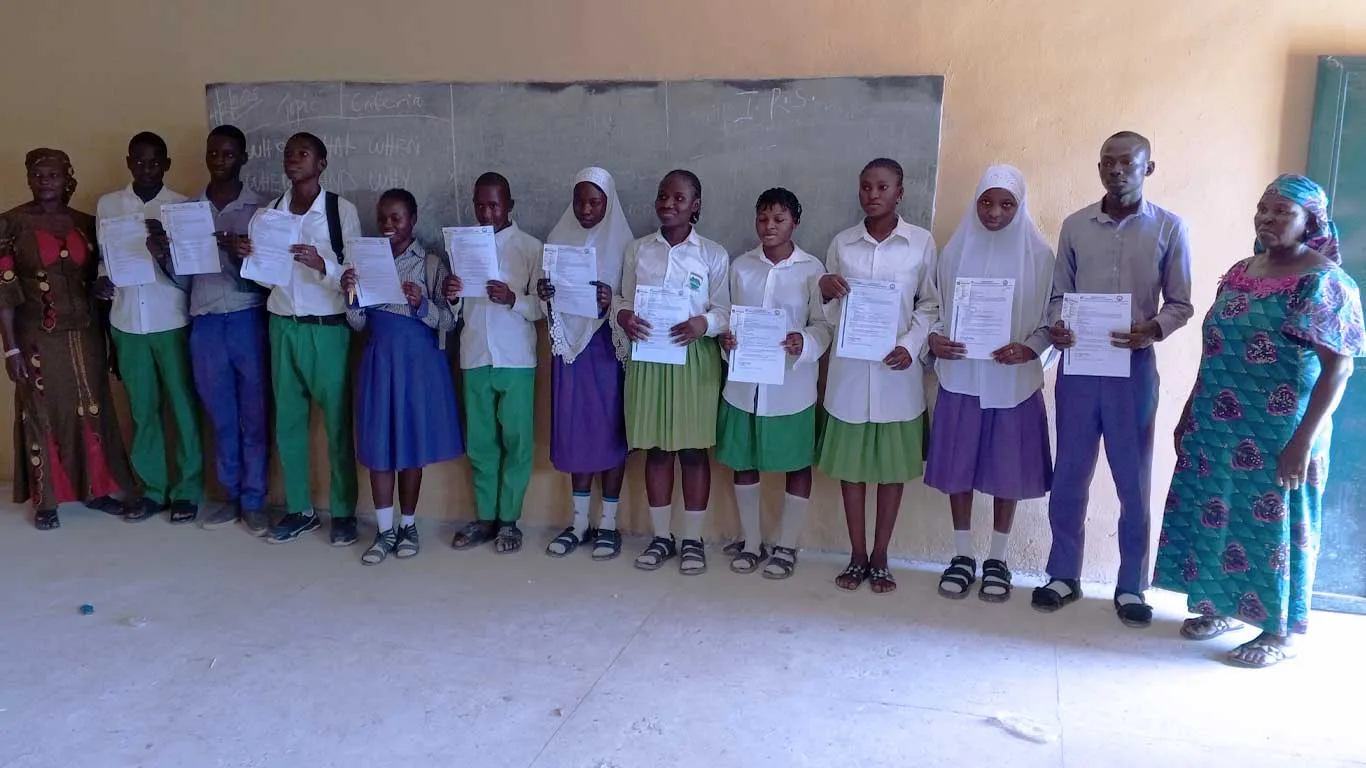 Students at Tudun Wada Secondary School holding their certificates