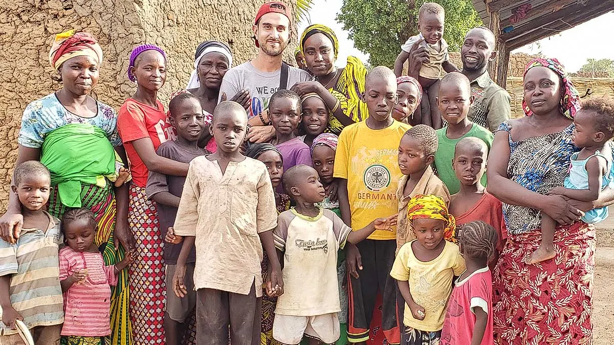 Ali with the village