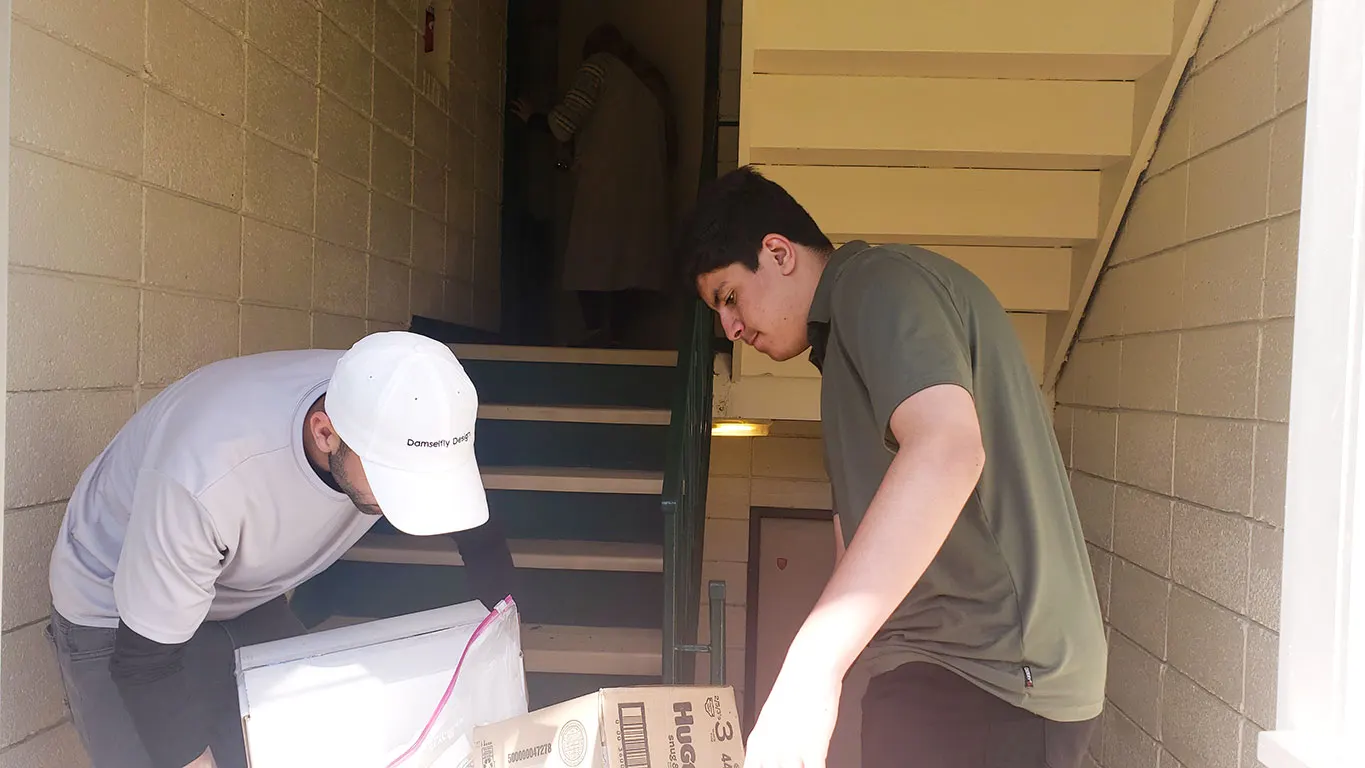 moving food boxes to Afghan families