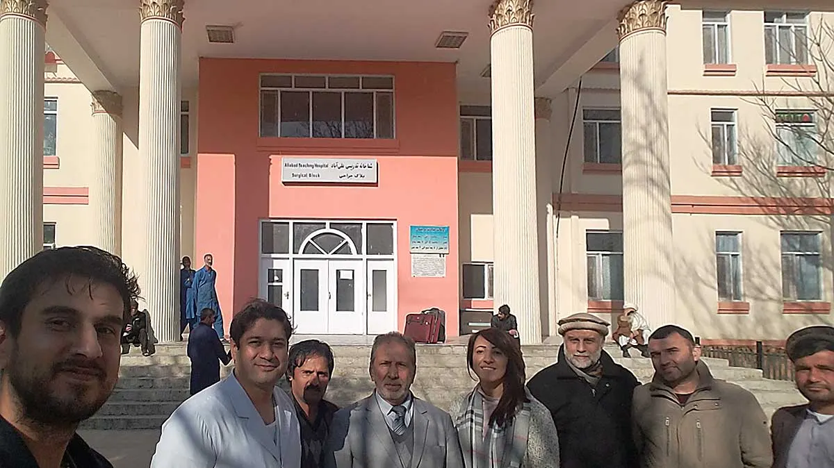 The dedicate staffs in front of the Aliabad hospital with Ali Karim