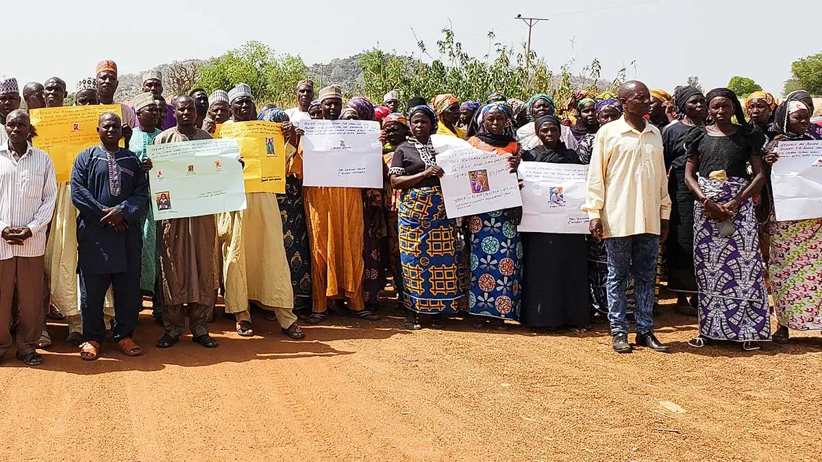 Chibok village holding poster for missing girls