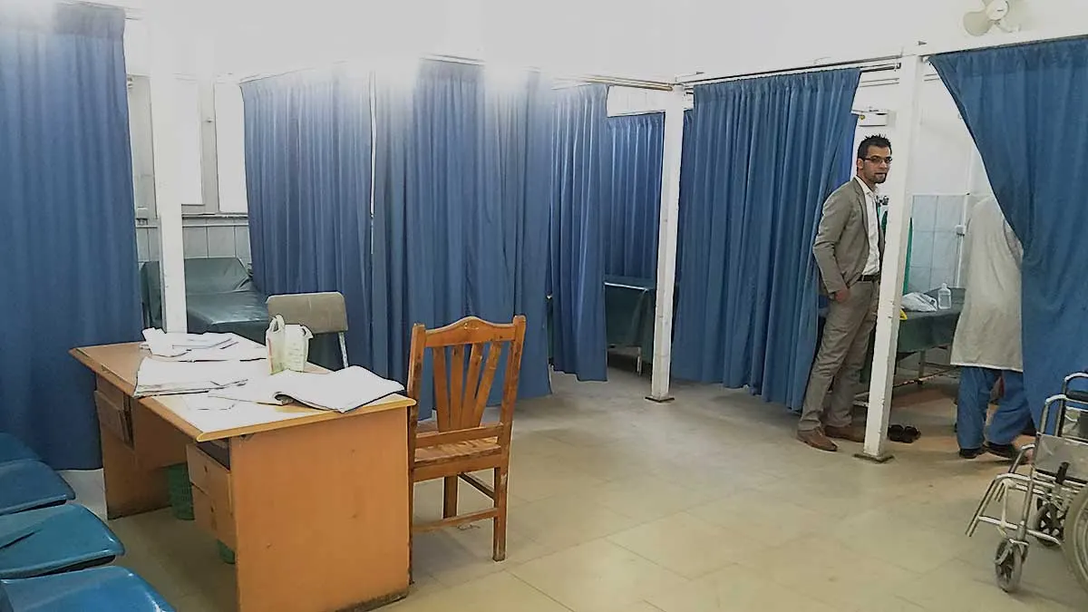 Aliabad hospital triage with one family member and doctor